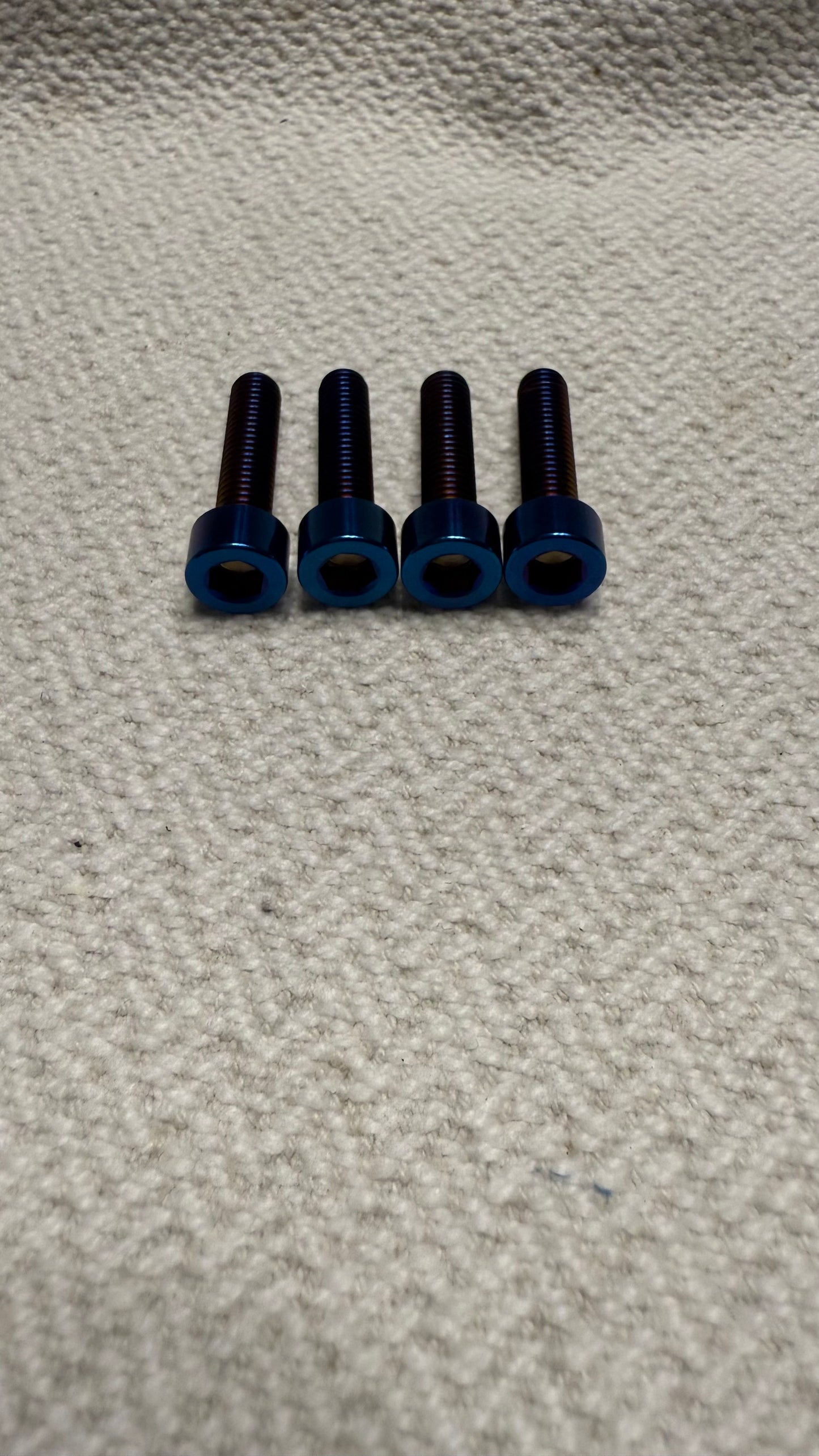 Super 73 bar clamp bolts (burned blue titanium. Fits ridstar,tuttio, razor, macfox, zooz, ect…)